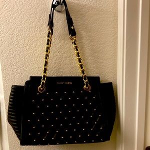 Like new Black and Gold Guess purse